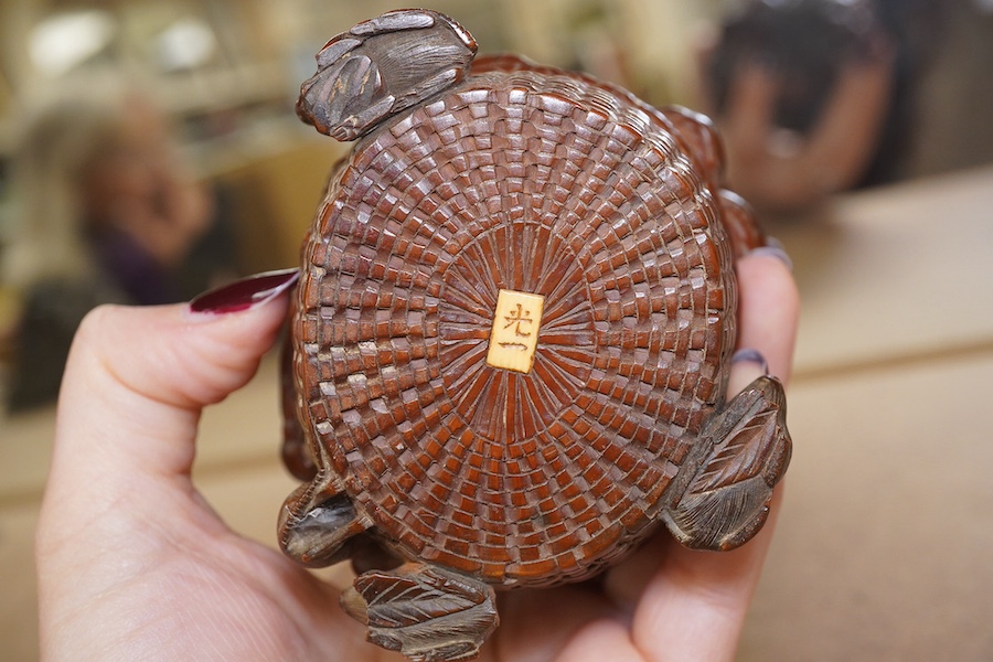 A Japanese boxwood koro and cover, Meiji period, modelled as a basket of fruit with mice, signed to the base, 9cm wide. Condition - fair to good, some chipping